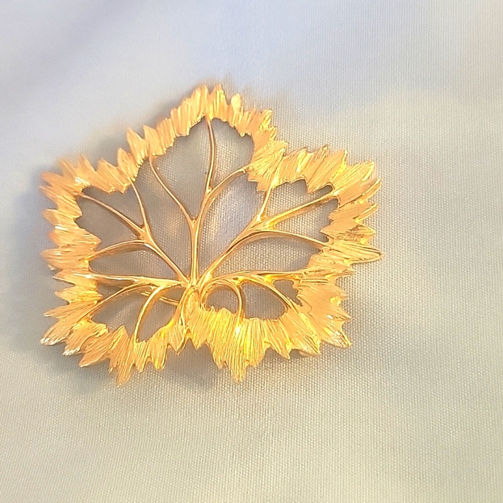 Vintage Napier goldtone maple leaf